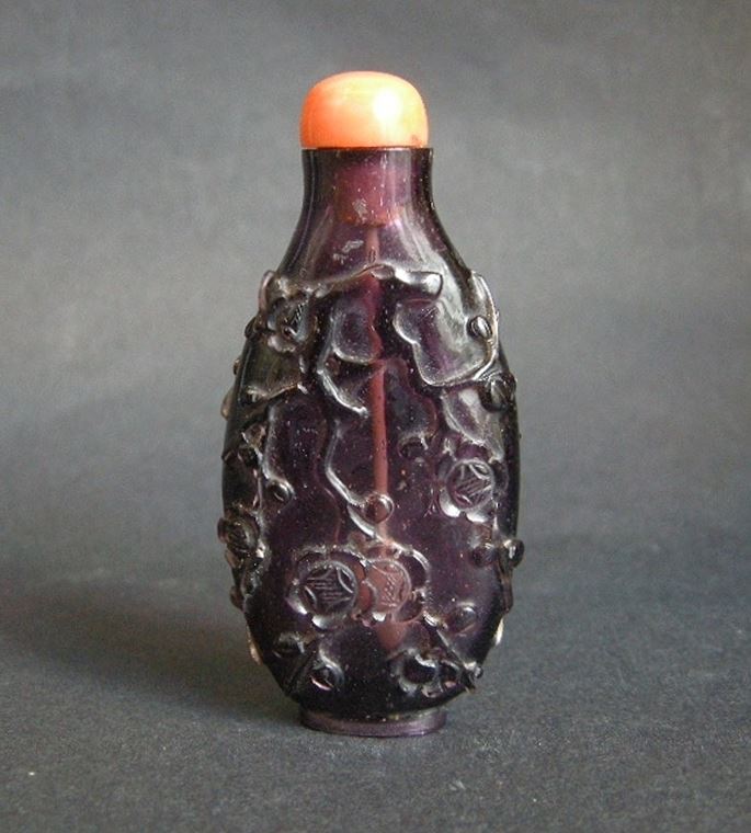 Snuff bottle overlay glass amethyst color sculpted of flowery branches and prunus | MasterArt